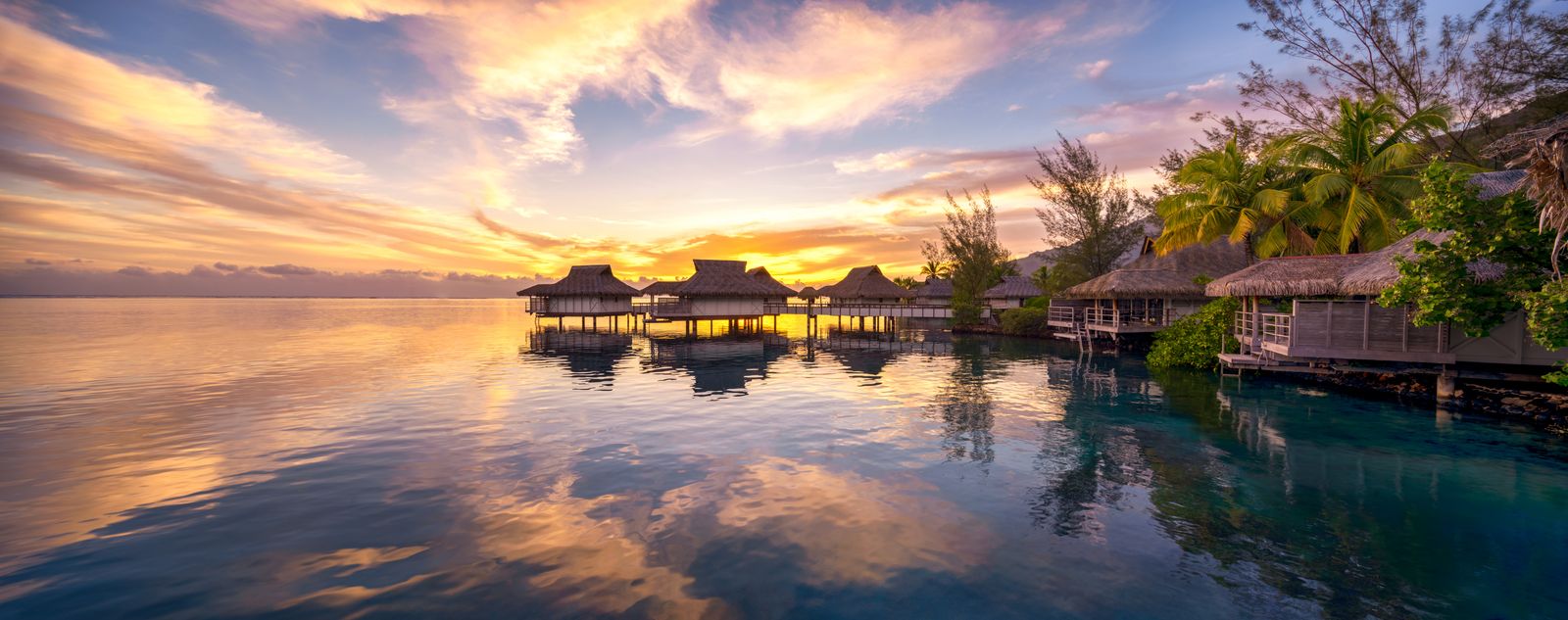 A sunset hospitality moment by the water