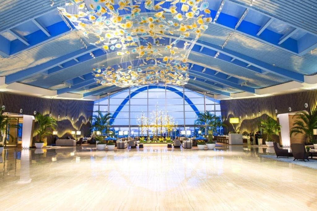 Bright central lobby inside Forest City Marina Hotel