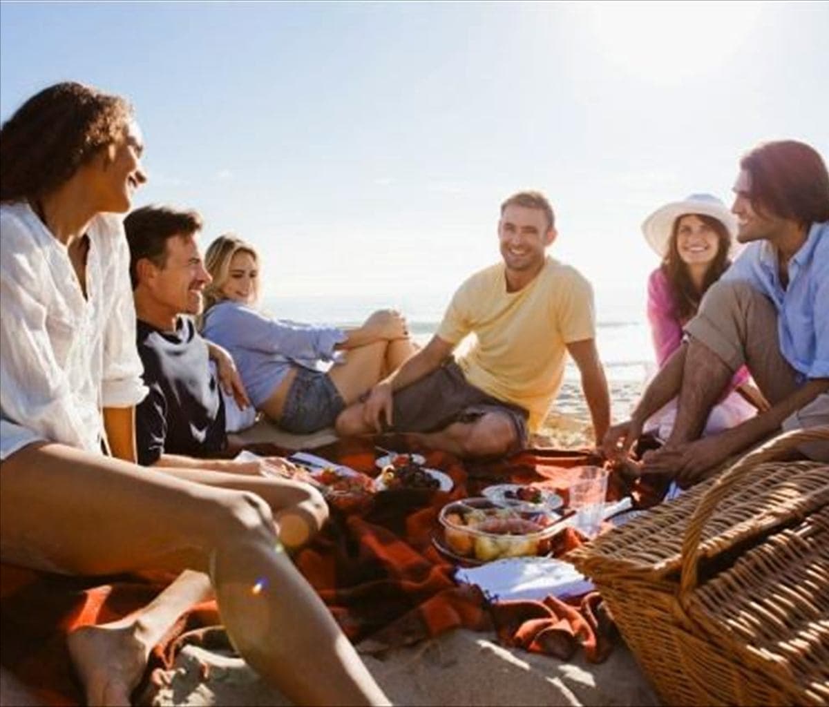 A company group exchanging ideas around a shared table