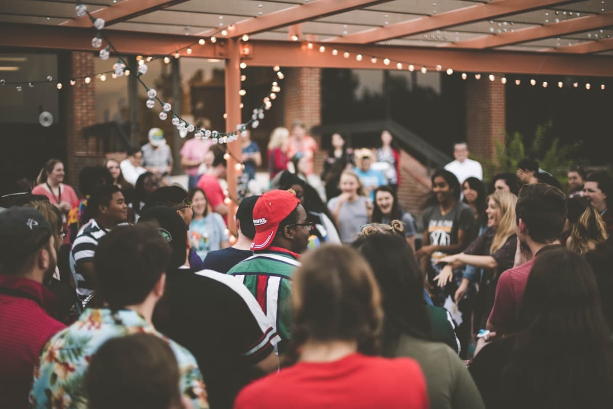 An invited community gathering during a hosted event